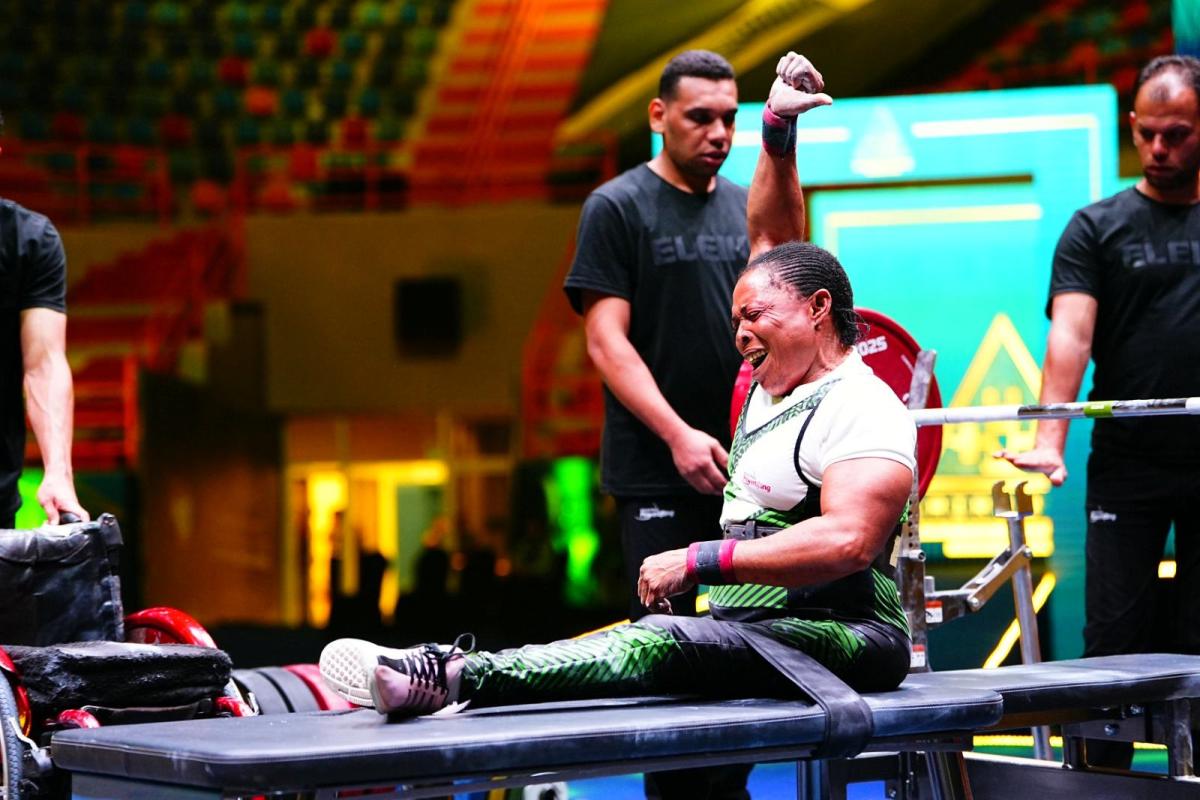 An athlete celebrates in joy